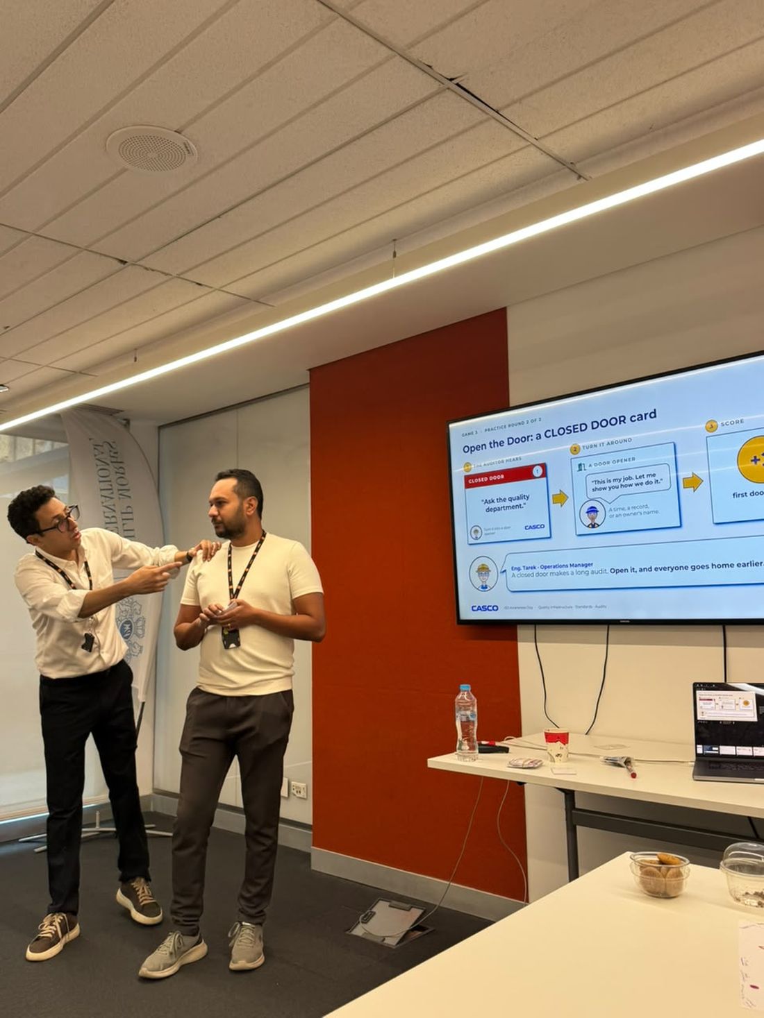 Two participants presenting their answer