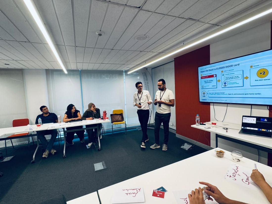 Two participants presenting to the room